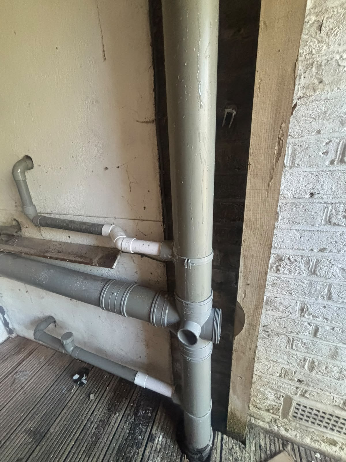 New external down pipes on home