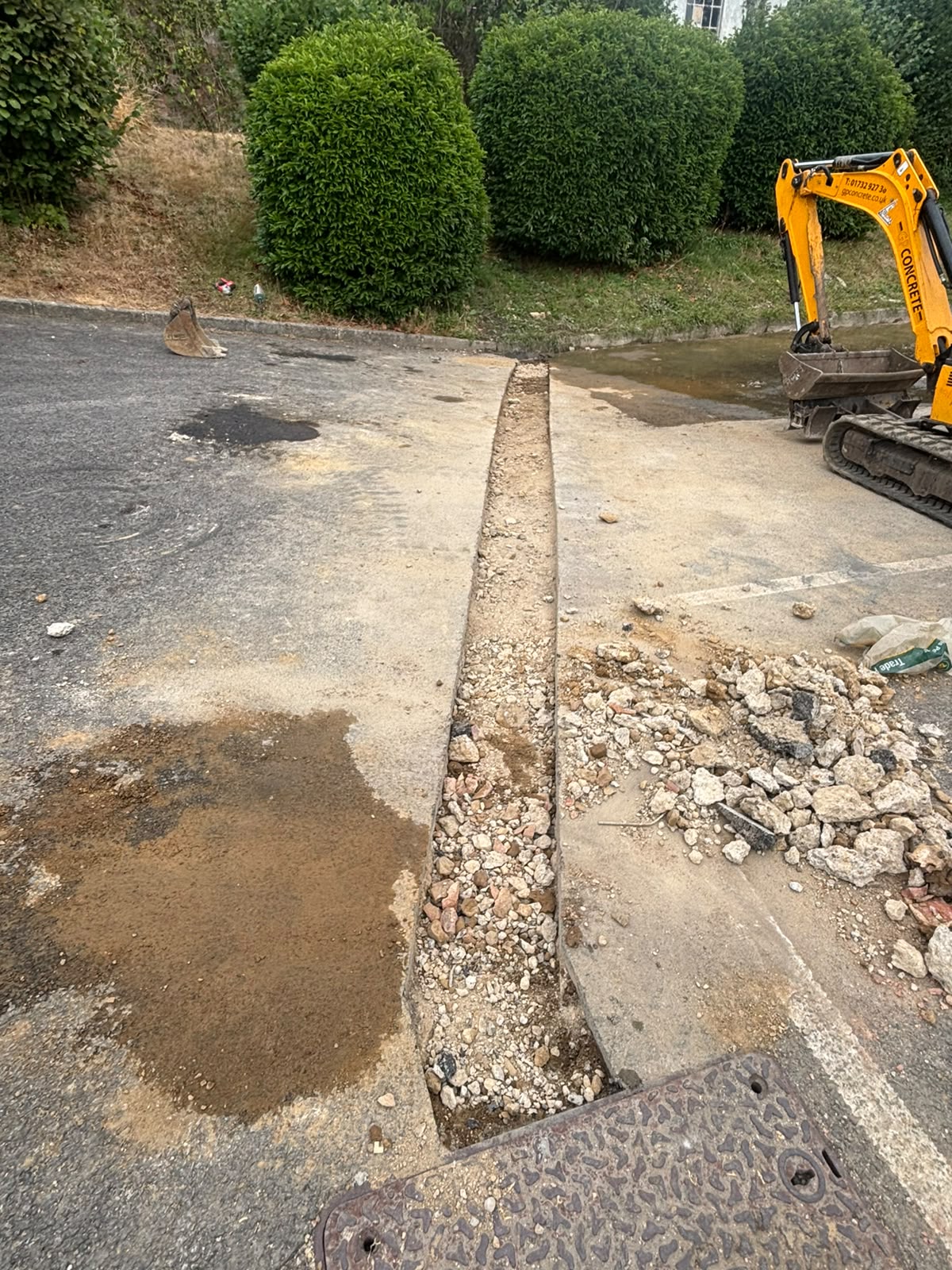 Dug up pipes trench filled in